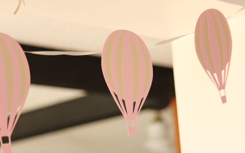 DIY hot air balloon bunting for baby shower decorations.