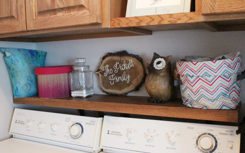 Add a simple removable shelf over your washer and dryer in your laundry room.